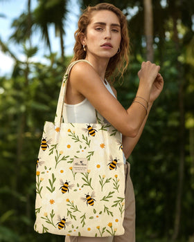 Miss Adola corduroy tote buckle closure keeps belongings secure.