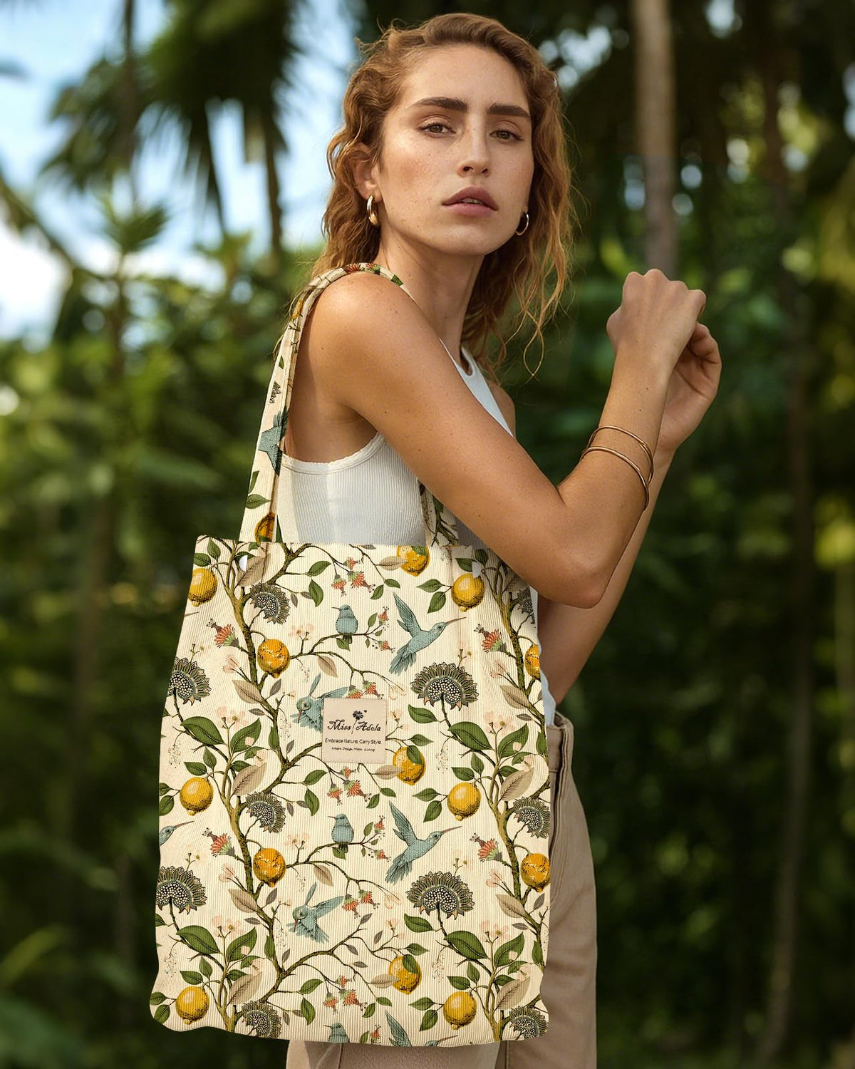 Miss Adola corduroy tote with buckle closures for easy access and safety.