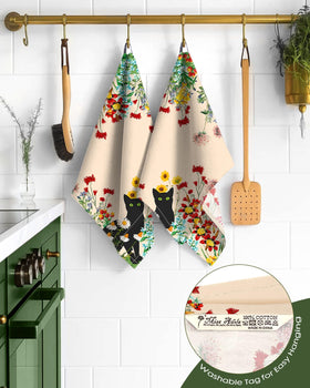 Miss Adola flour sack towel with hanging loop for easy reach.