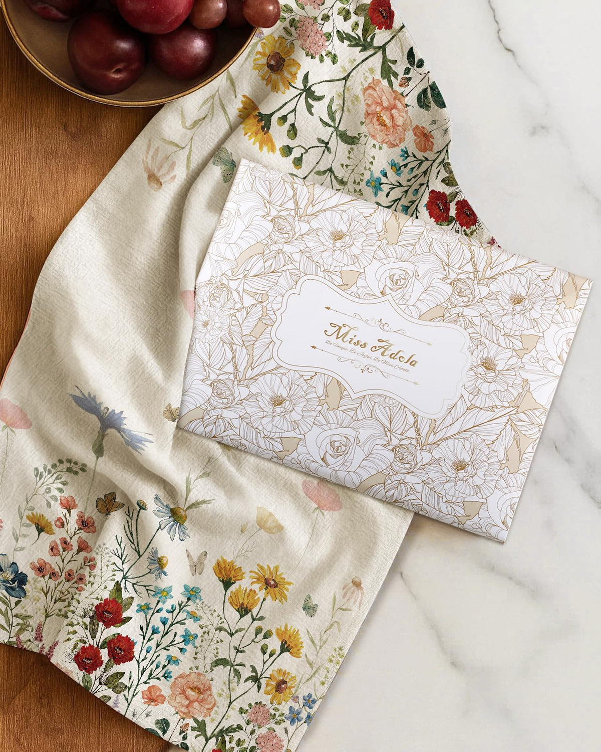 Miss Adola flour sack towels set offers two coordinated pieces.