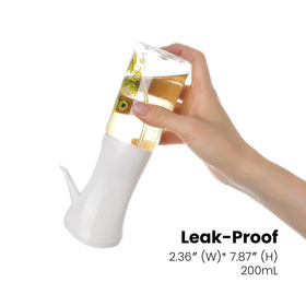 Mistifi Oliver Oil Sprayer – nozzle detail shows fan-shaped mist for even coverage.