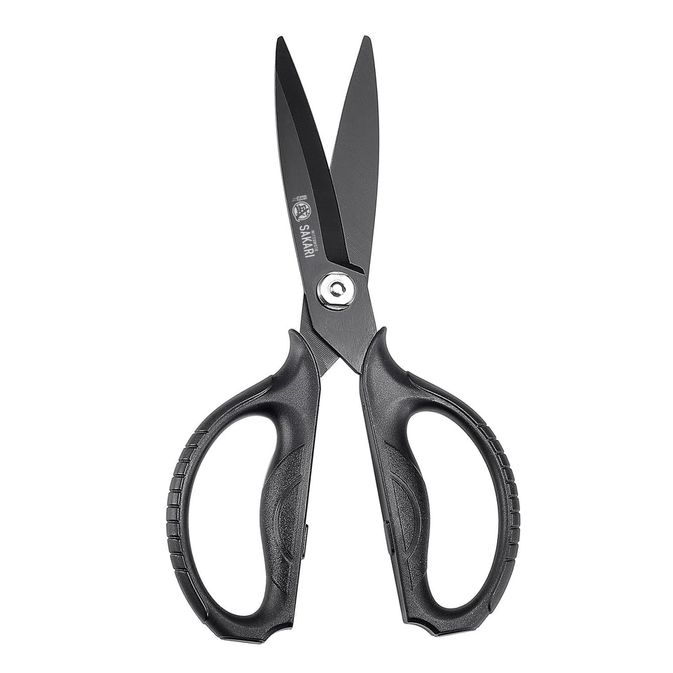 MITSUMOTO SAKARI kitchen scissors blade close-up highlights titanium plates for precise cuts.
