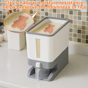 Measuring cup included with Mity Rain dispenser for precise portions.