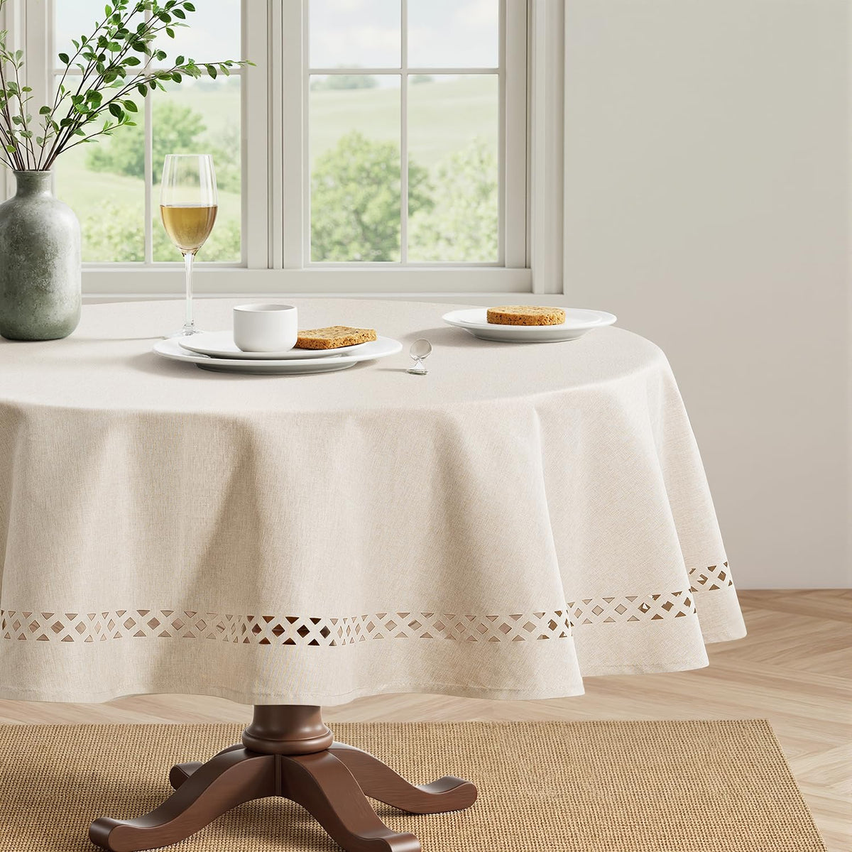 MIULEE beige round tablecloth with decorative cutouts enhances formal table settings