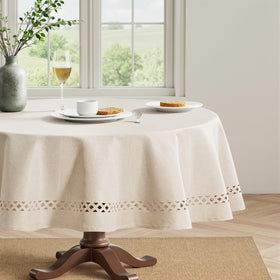 MIULEE beige round tablecloth with decorative cutouts enhances formal table settings