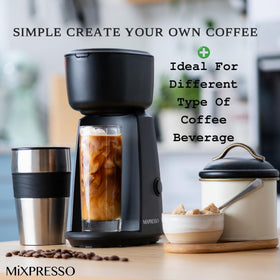 Mixpresso travel mug in car cup holder, ideal commute companion.
