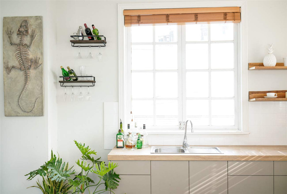 Mkono rustic wood floating shelves for bottles, glasses, and decor.
