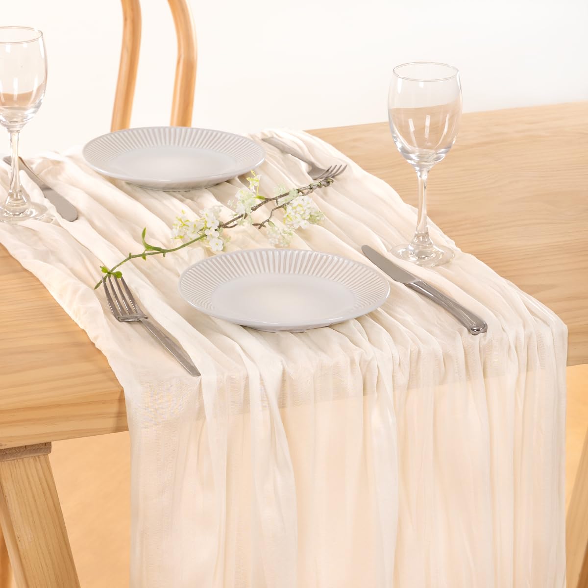MLMC ivory cheesecloth runner neatly placed on a wedding table with airy texture