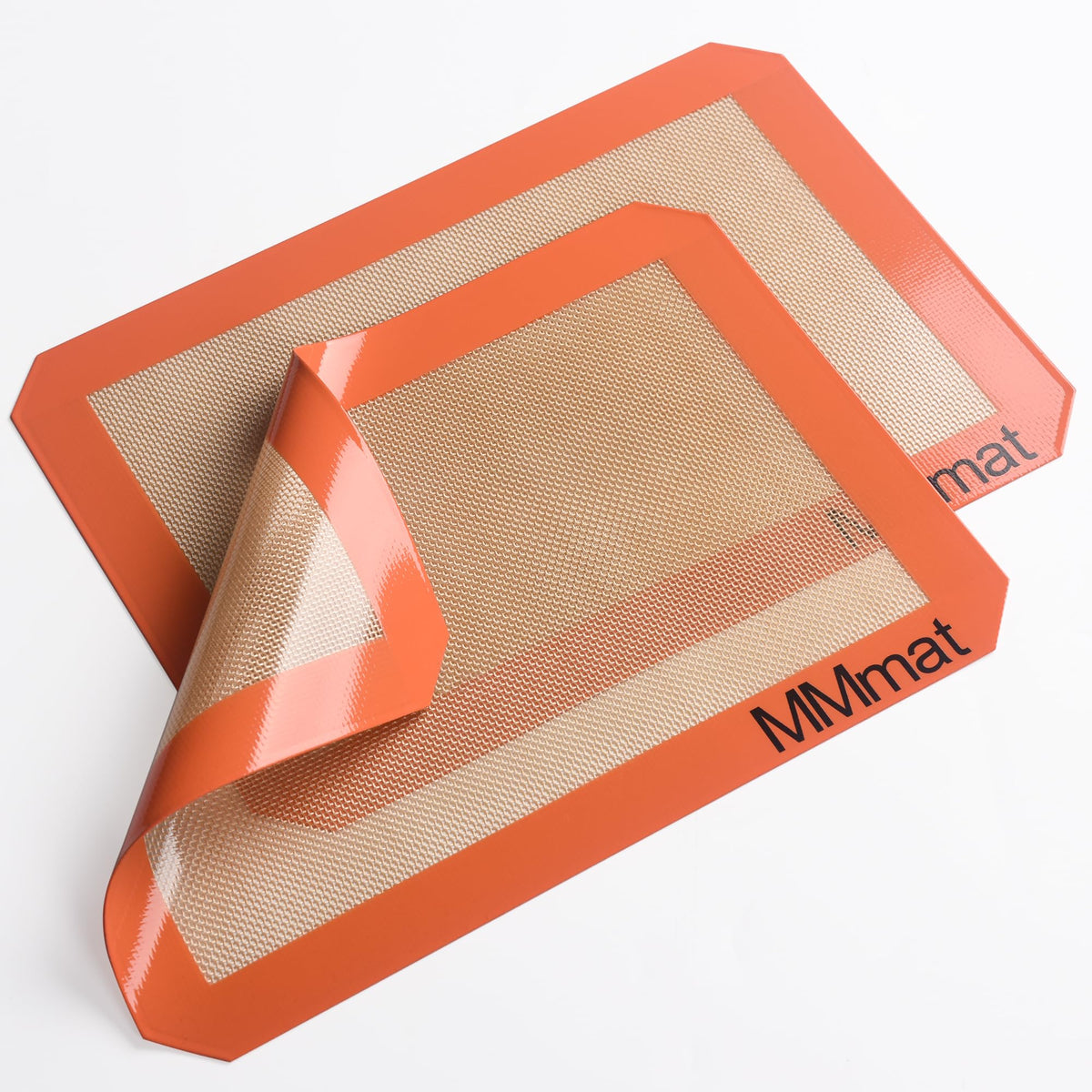 MMMAT baking mat shown in oven-safe setup for cookies.