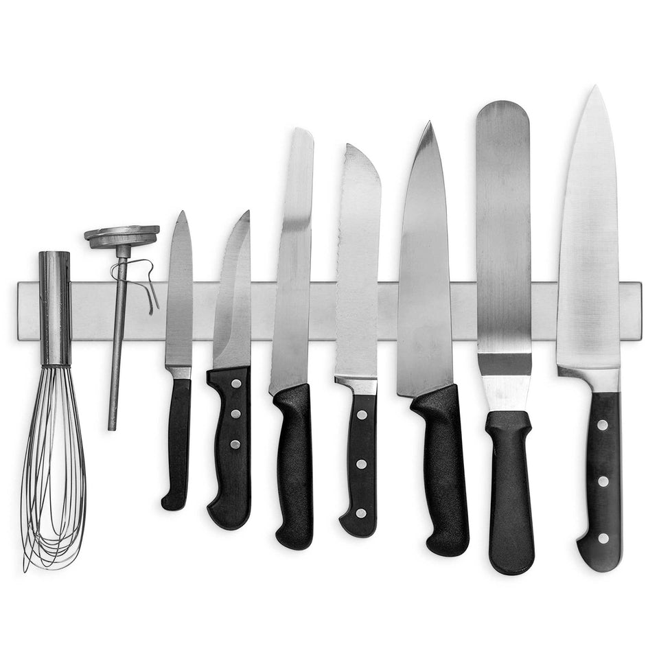 Modern Innovations 18-inch magnetic knife bar mounted on kitchen wall keeps knives organized and accessible.