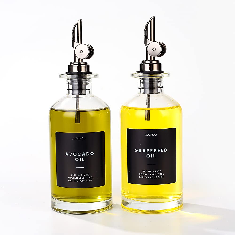 Molimoli oil and vinegar dispenser with metal pour spout for precise pouring.