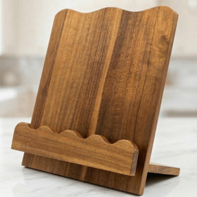 Moncur Home beautiful wooden cookbook stand on a counter for easy recipe viewing.