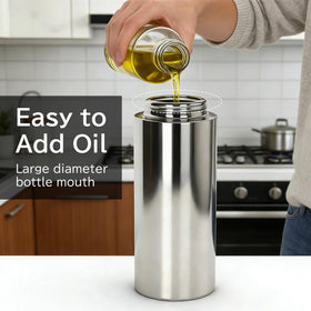 Moniko olive oil sprayer nozzle delivers even mist for controlled cooking.