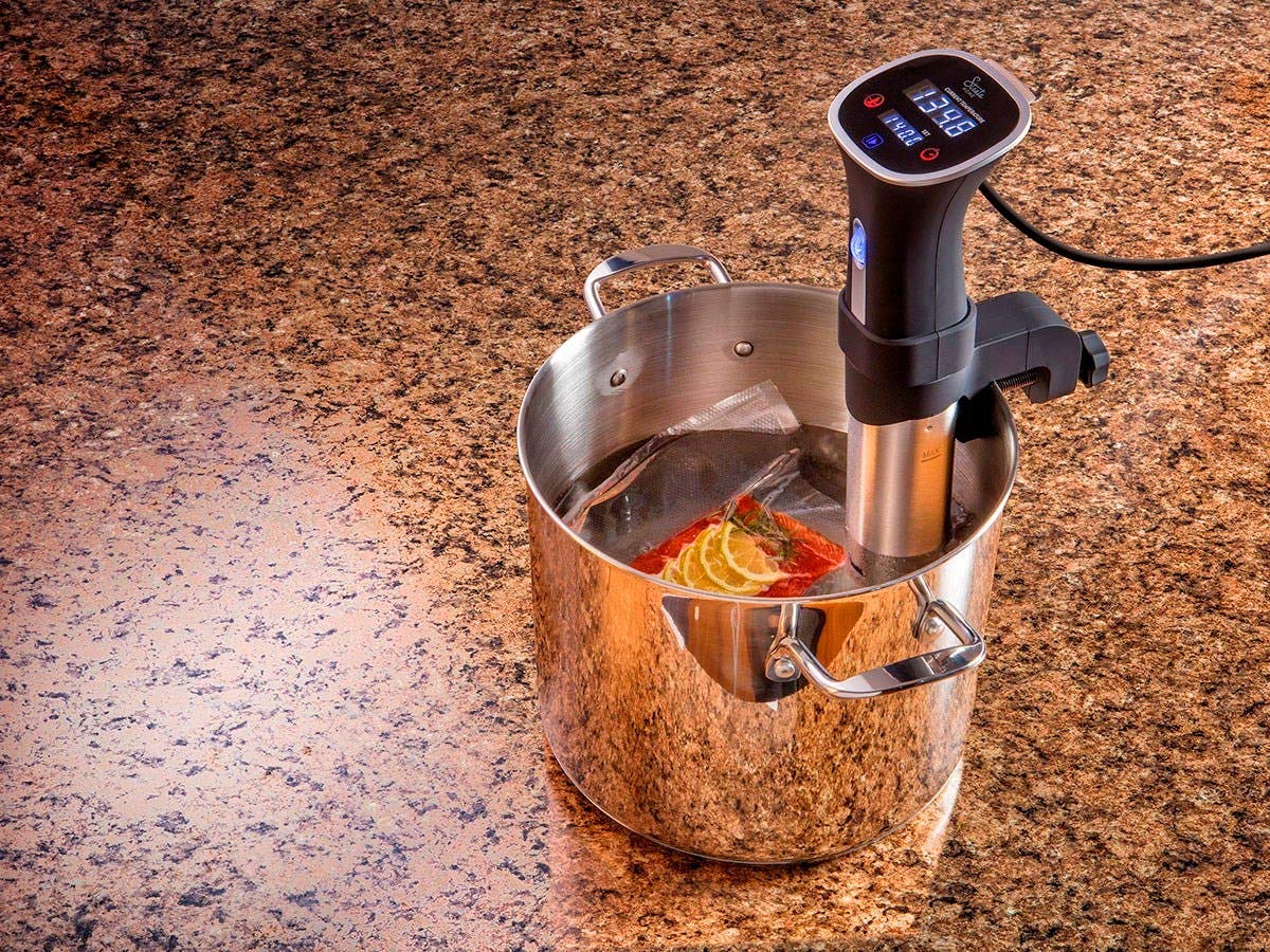 Sleek black and silver Monoprice sous vide immersion cooker design in modern kitchen
