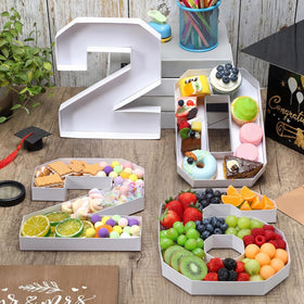 Mooliwe 2026 numbers on a candy and berry tray for festive decor.
