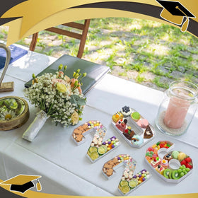 Mooliwe graduation numbers used as decorative and edible treat boxes.