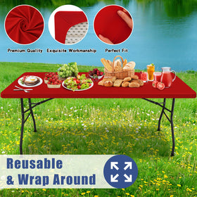 Moosfor red tablecloth in picnic setup for outdoor dining.