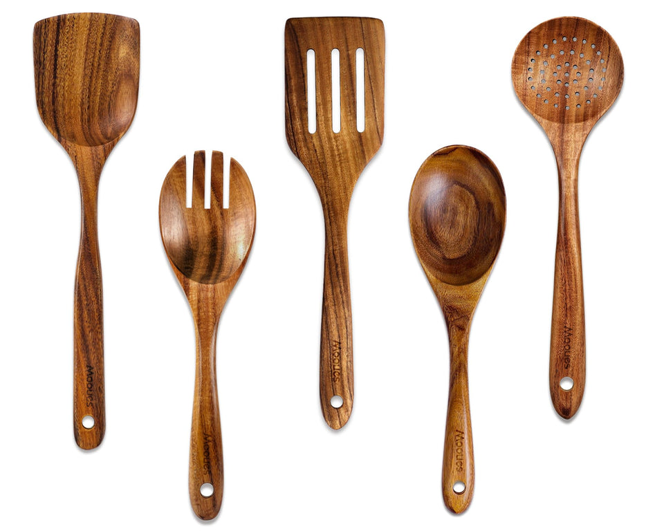 Mooues teak utensils set displayed on kitchen counter for easy access