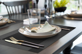 More Decor placemats showcase a durable PVC vinyl weave for daily use.