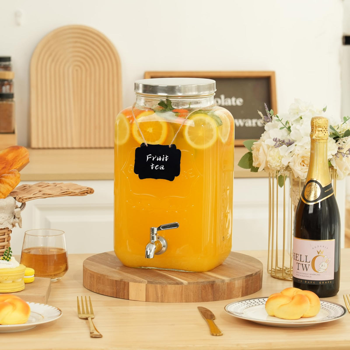 Moretoes clear glass dispenser ideal for juice and iced tea.