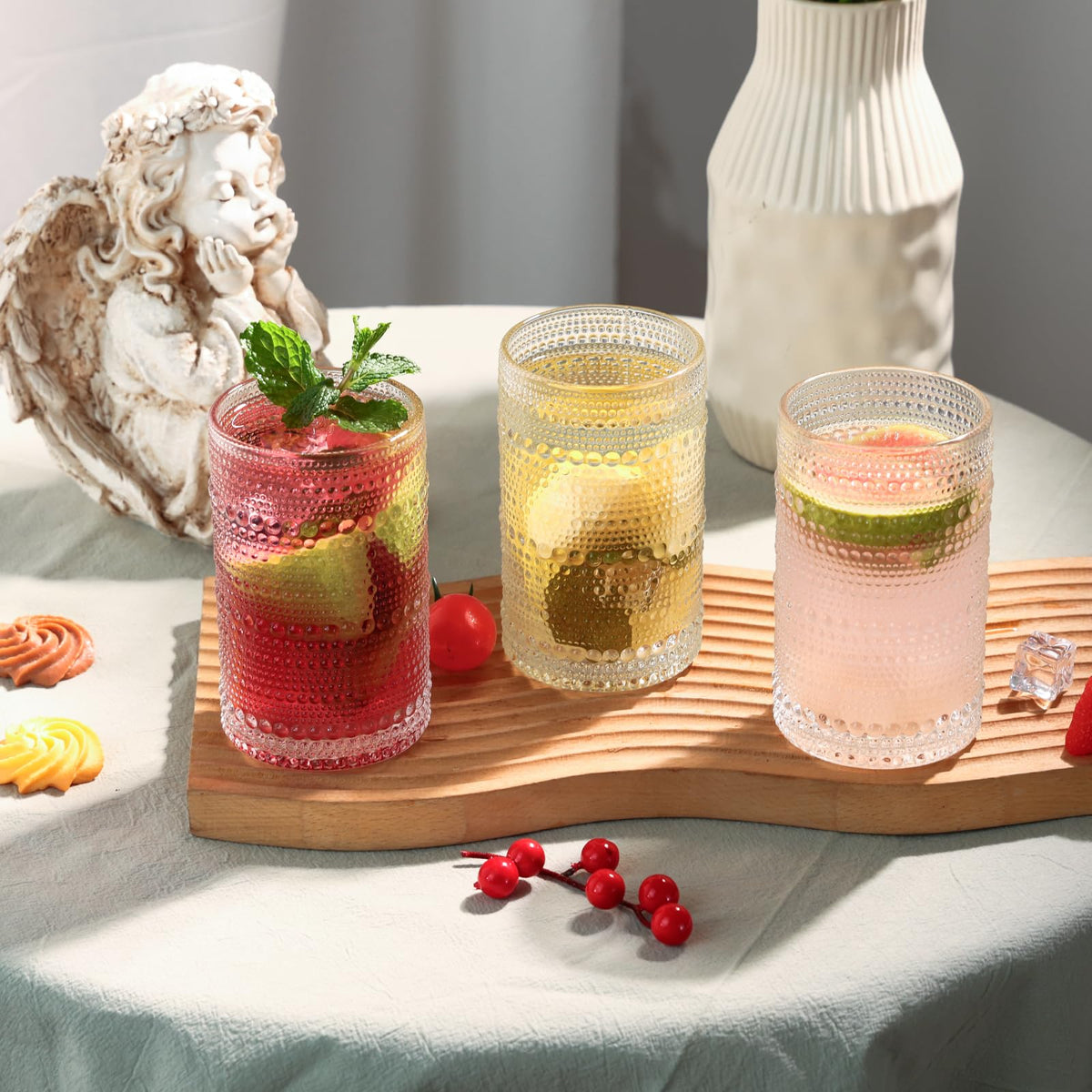 Moretoes hobnail glasses in use for cocktails, beer, and mixed drinks.