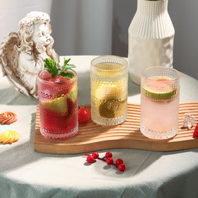 Moretoes hobnail glasses in use for cocktails, beer, and mixed drinks.