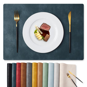 MOSAYT vinyl placemats navy blue full set on dining table protecting surfaces.