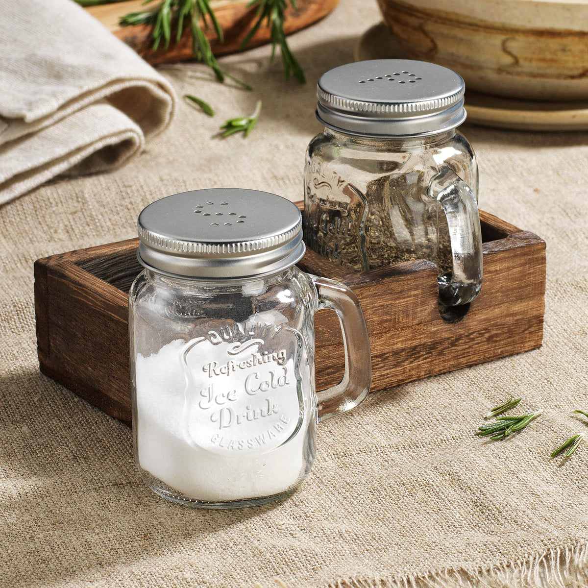 MosJos vintage glass dispensers holder adds farmhouse charm on wooden tray.