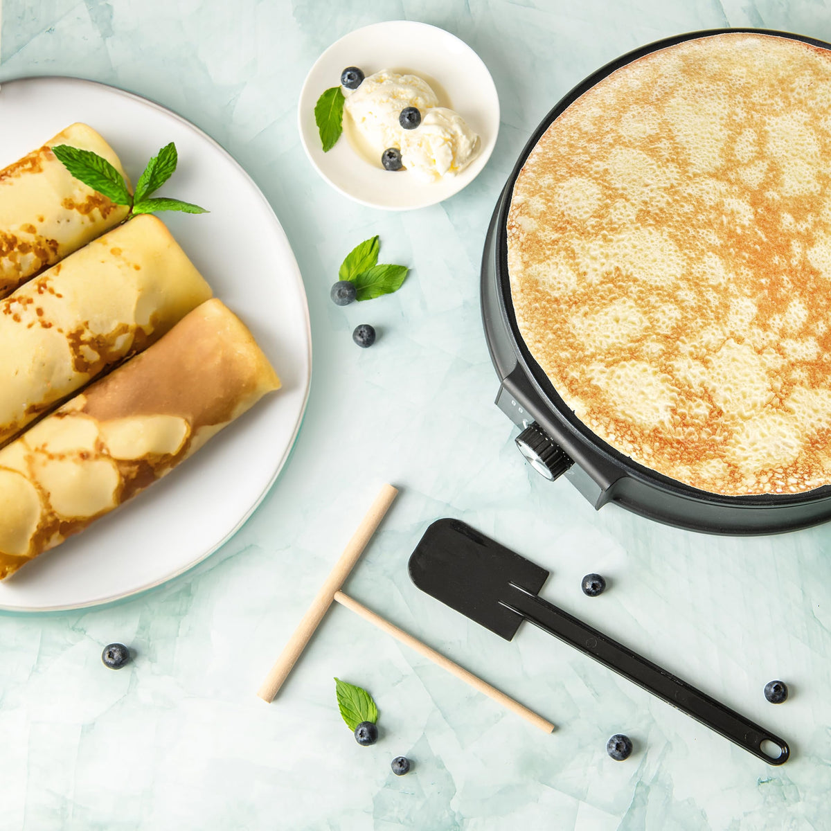 Moss & Stone batter spreader included for precise crepe spreading.