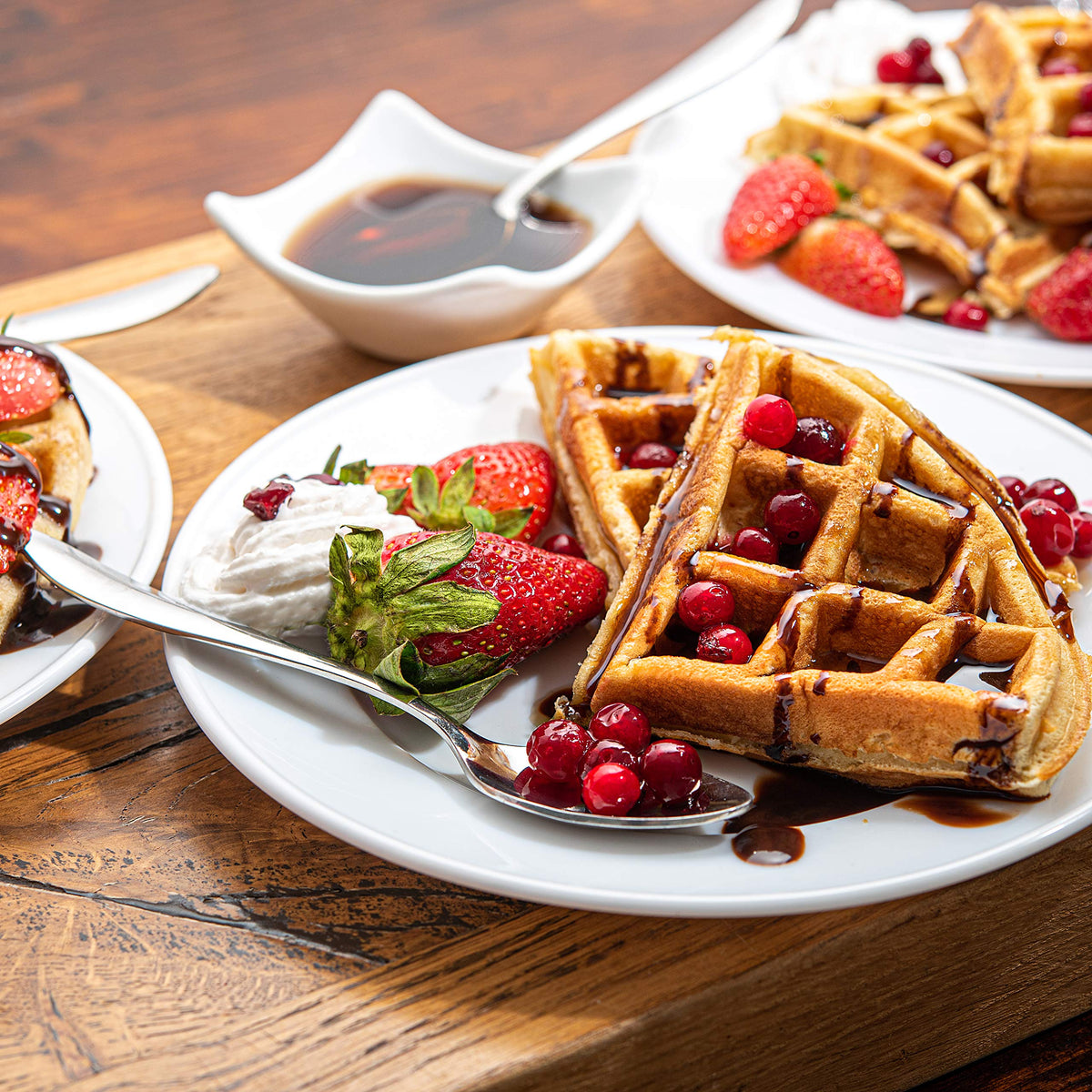 Moss & Stone waffle maker raised sides reduce spills during cooking.