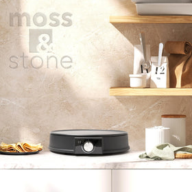 Moss & Stone cord wrap storage keeps your counter tidy.