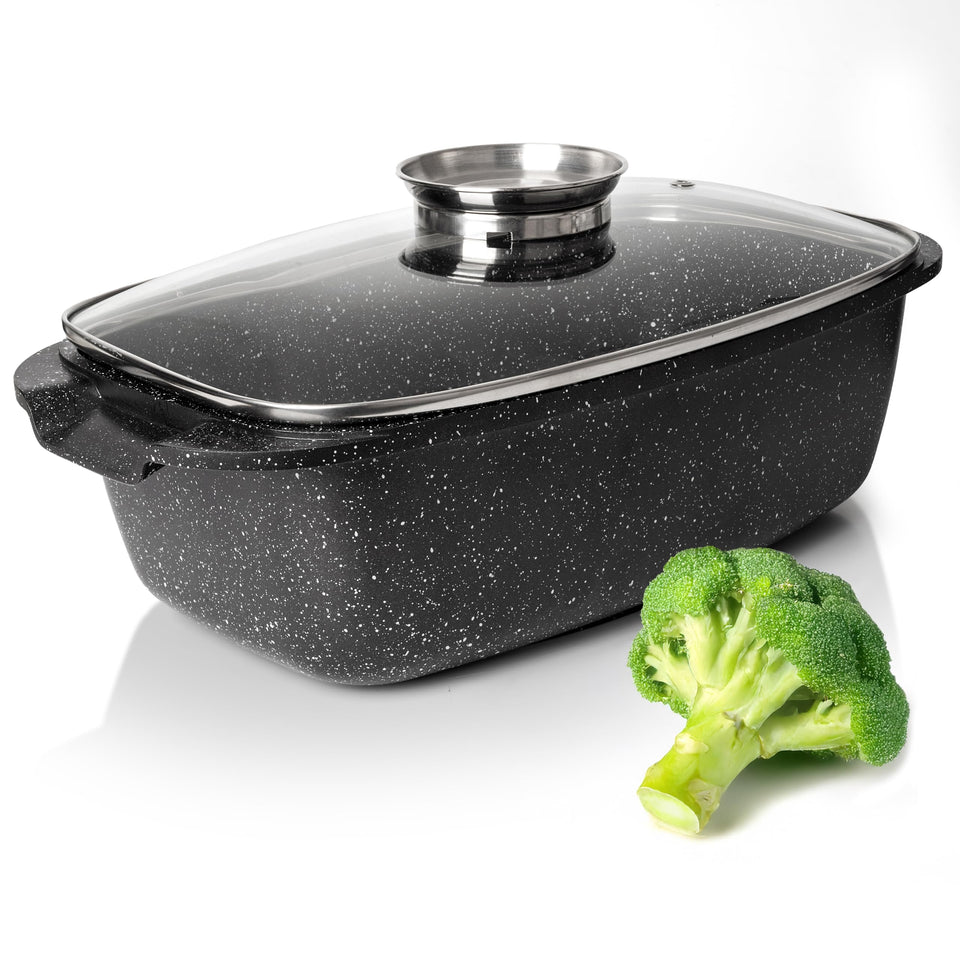 Moss & Stone 6qt oval roaster with lid delivers steady heat for even roasting.