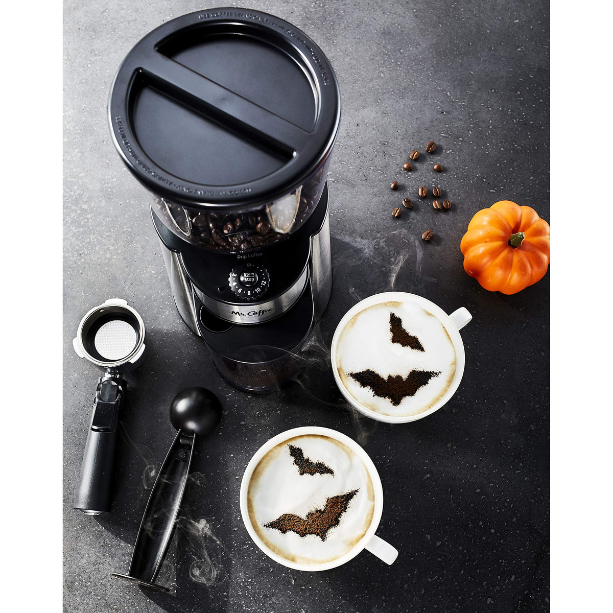 Elegant silver finish of the Mr. Coffee burr mill grinder on a counter.