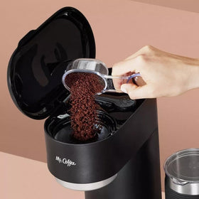 Mr. Coffee compact design side profile emphasizes space-saving in kitchens.