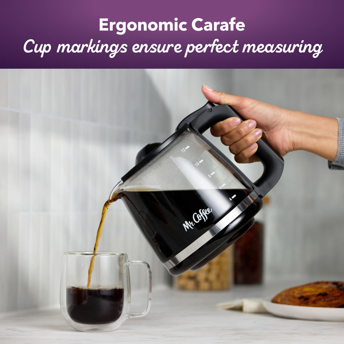 Mr. Coffee glass carafe with black handle for comfortable, steady pouring.