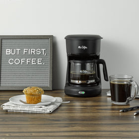 Mr. Coffee ON/OFF switch indicator shows when the brewer is active.
