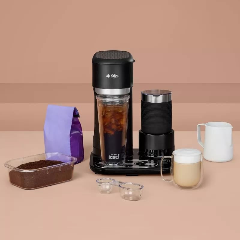Mr. Coffee tumbler in use demonstrates spill-free serving on the go.