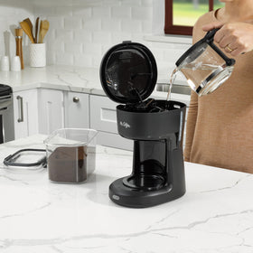 Mr. Coffee updated ergonomic carafe with ounce markings for precise measuring.