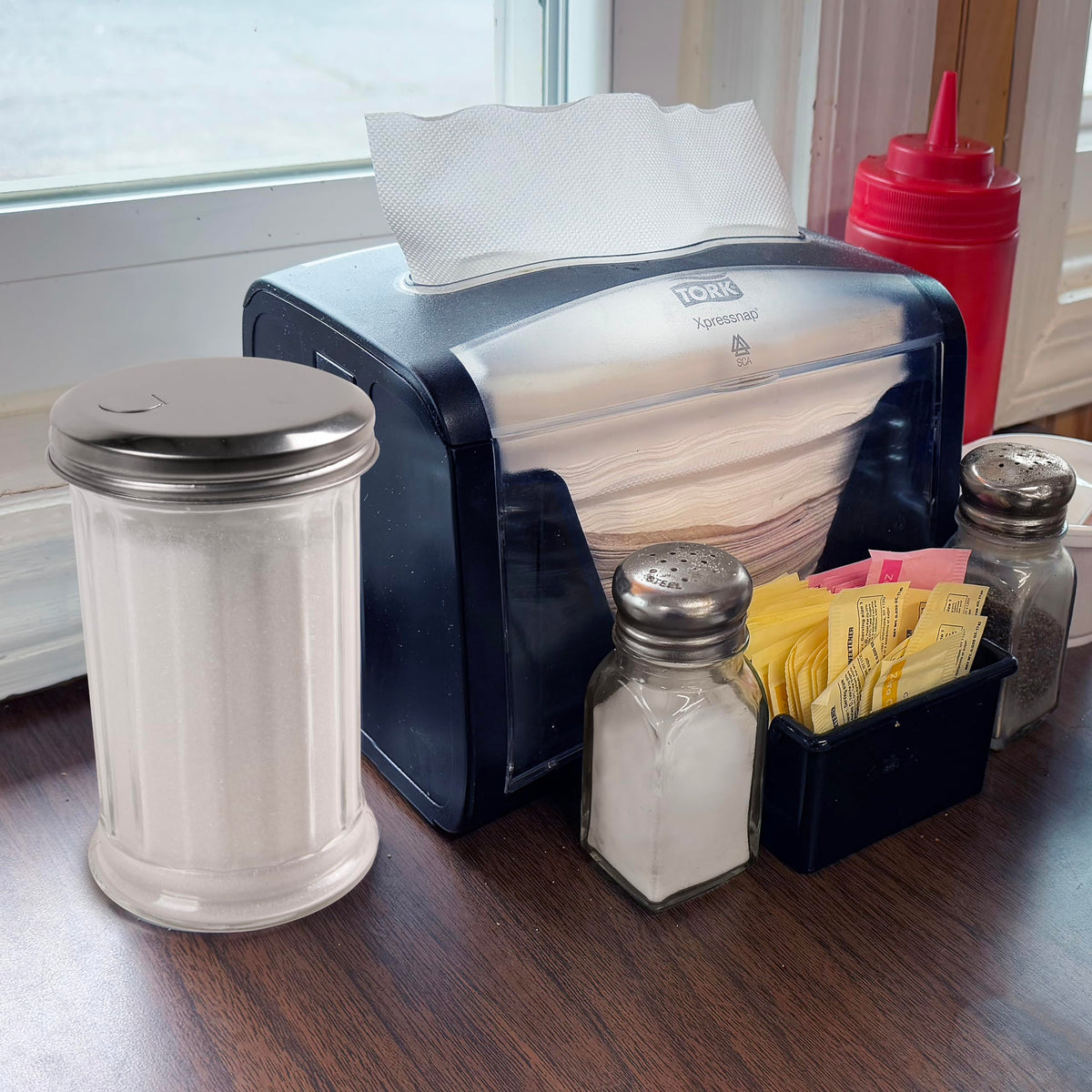 Mr. Kitchen diner-style glass jar set adds vintage charm to kitchen shelves.