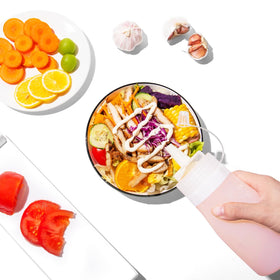 Measurement marks help portion sauces accurately.