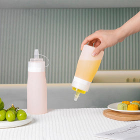 BPA-free silicone bottle keeps kitchen safe and hygienic.