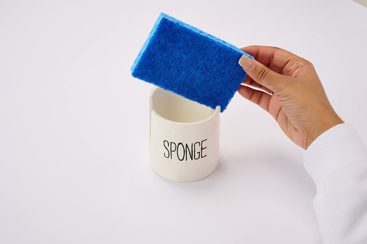Mud Pie holder keeps sink area organized while you wash and rinse.