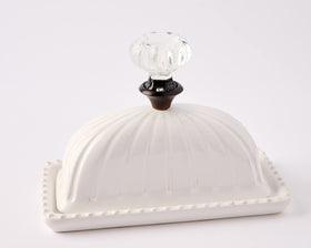 Mud Pie lid with fluted detailing and glass knob adds classic character.