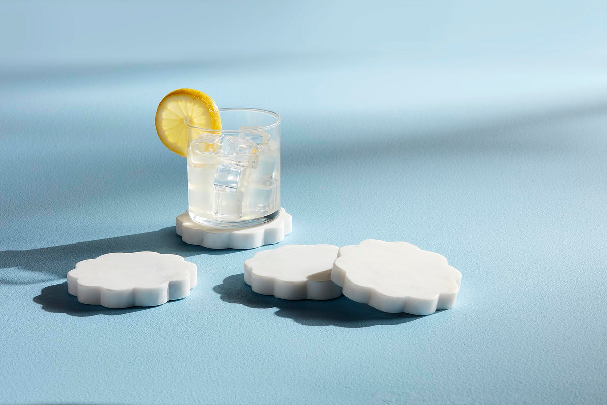 Mud Pie scallop marble coaster veining detail highlights unique pattern and sophisticated decor.