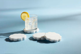 Mud Pie scallop marble coaster veining detail highlights unique pattern and sophisticated decor.
