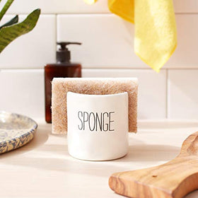 Mud Pie sponge holder features a slit for easy sponge storage near the sink.