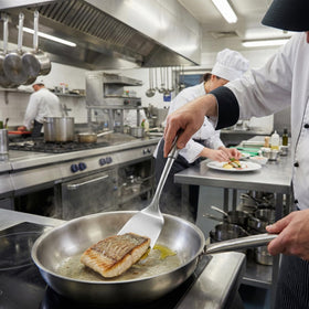 MUJINON spatulas shown with grill-ready setup for outdoor cooking.
