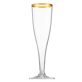 Munfix clear 5 oz champagne flute on table, perfect for toasts.