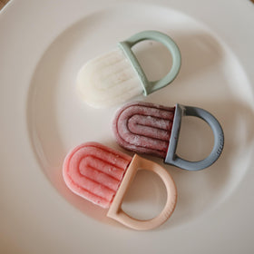 Mushie BPA-free ice pop tray ensures safe, convenient frozen snacks.