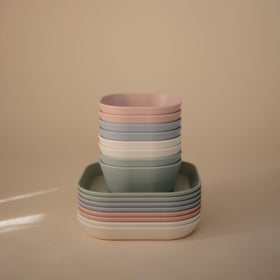 Mushie Ivory plates in kid-friendly mealtime scene